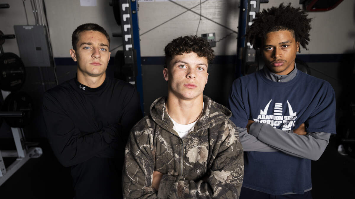 Cascade Christian’s Caleb Donahue, Donovan Walson and Tayven Collins pose for a portrait at Cascade Christian Schools on Wednesday, Oct. 29, 2025, in Puyallup, Wash.