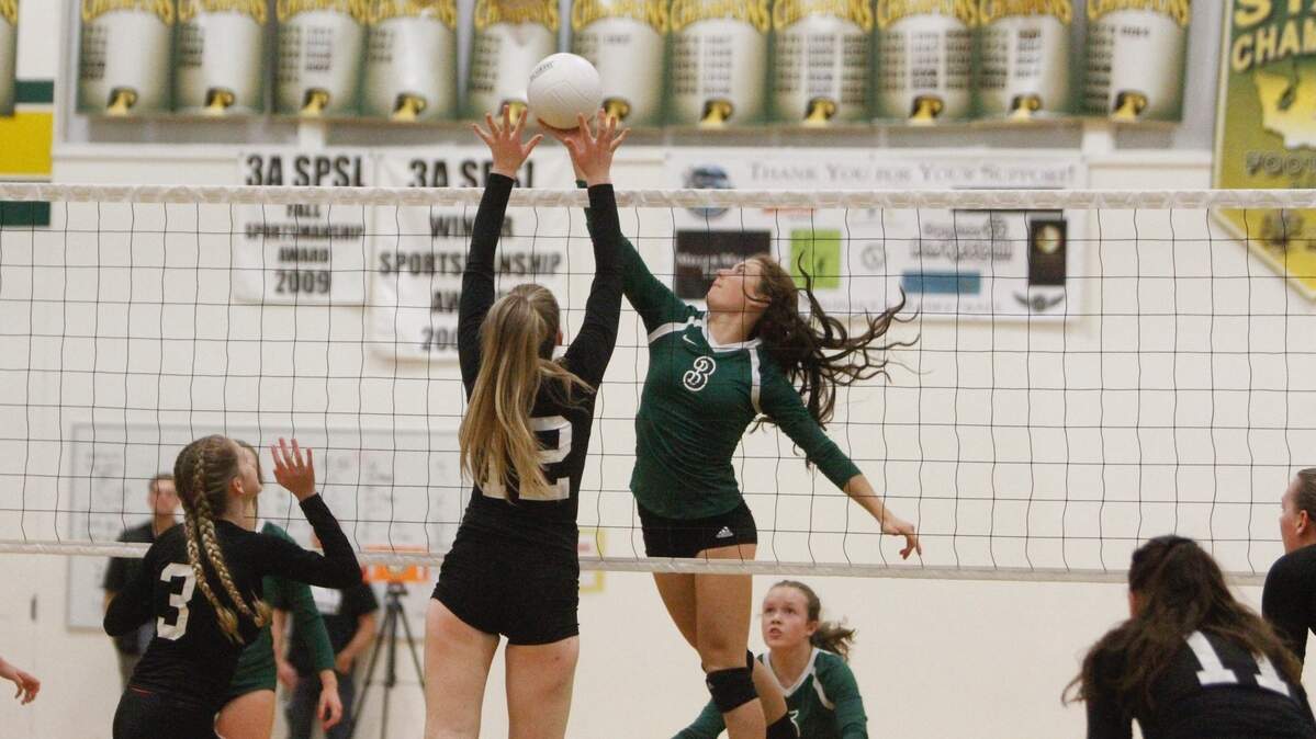 Peninsula High School’s Maeve Griffin sends the ball over the night against Central Kitsap.