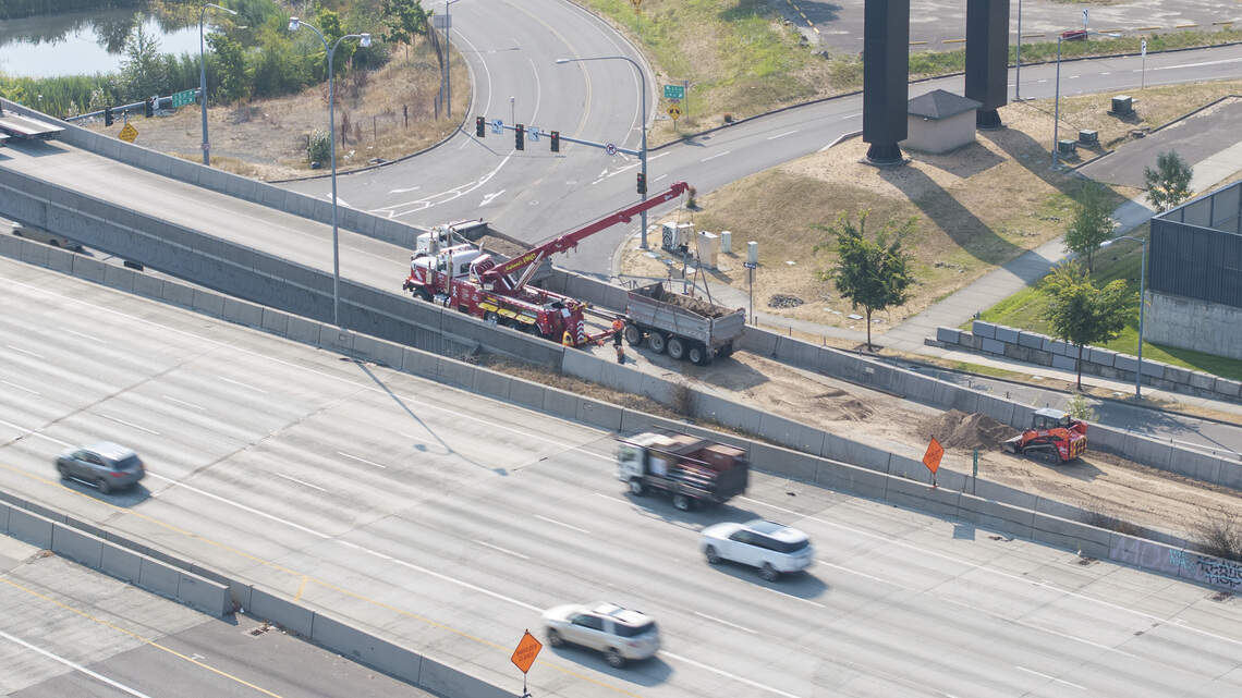 Overturned dump truck snarls traffic, blocks ramp on I-5