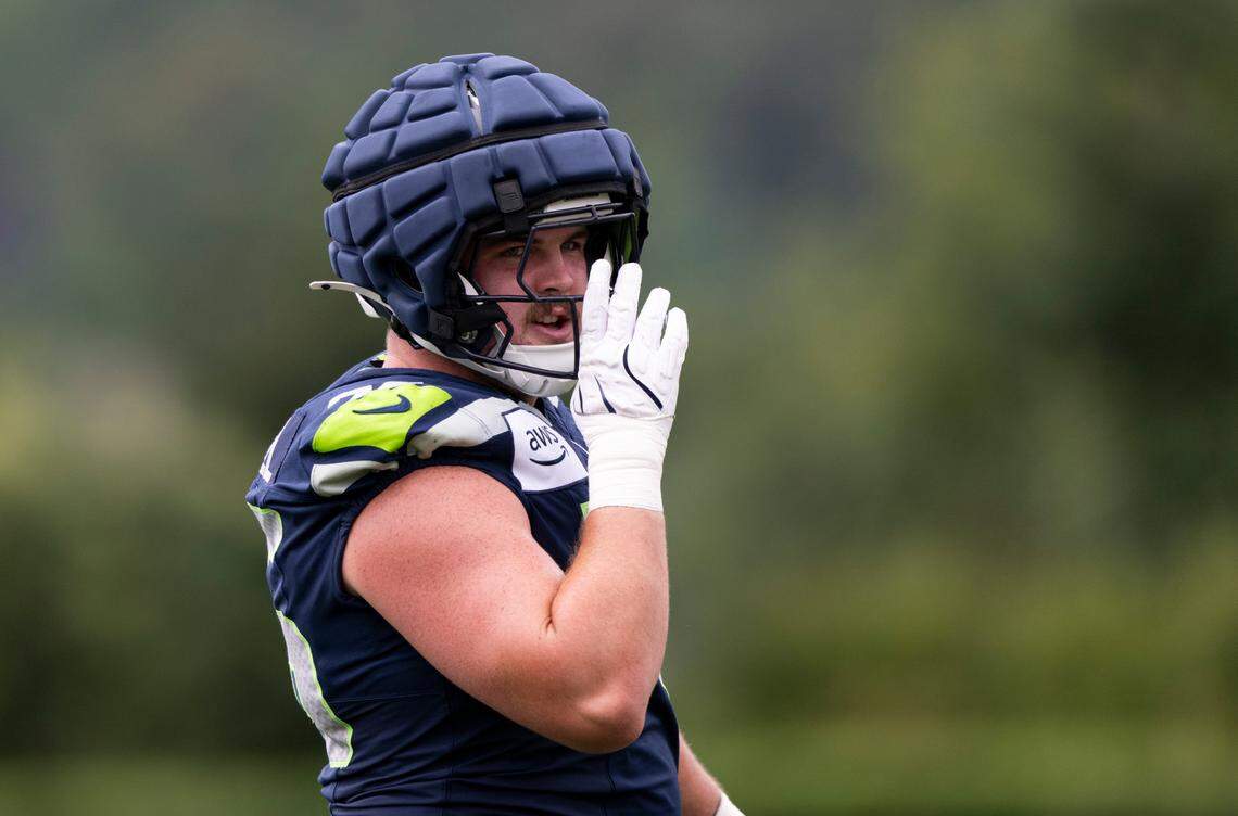 Seattle Seahawks guard Grey Zabel (76) runs drills during training camp at Virginia Mason Athletic Center on Friday, July 25, 2025, in Renton, Wash.