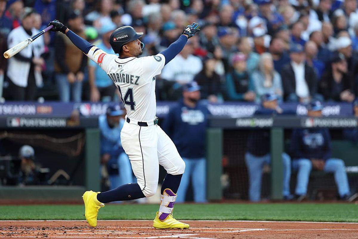 SEATTLE, WASHINGTON - OCTOBER 15: Julio RodrÃguez #44 of the Seattle Mariners hits a home run during the first inning against the Toronto Blue Jays in game three of the American League Championship Series at T-Mobile Park on October 15, 2025 in Seattle.