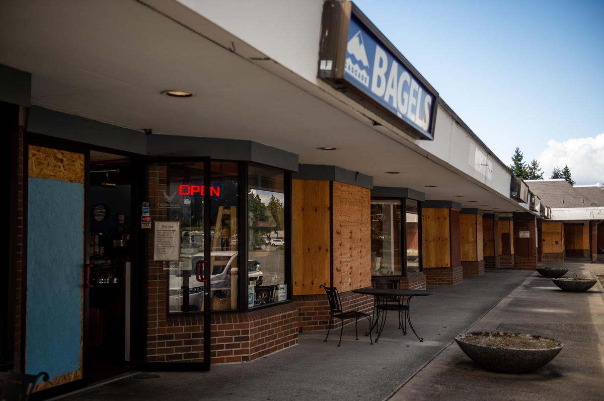 Cascade Bagel & Deli is seen among various shuttered shops in Lakewood on Aug. 12, 2019.
