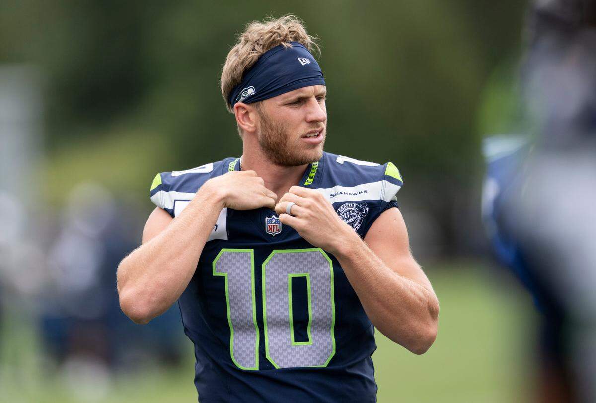 Seattle Seahawks wide receiver Cooper Kupp (10) warms up during training camp at Virginia Mason Athletic Center on Friday, July 25, 2025, in Renton, Wash.
