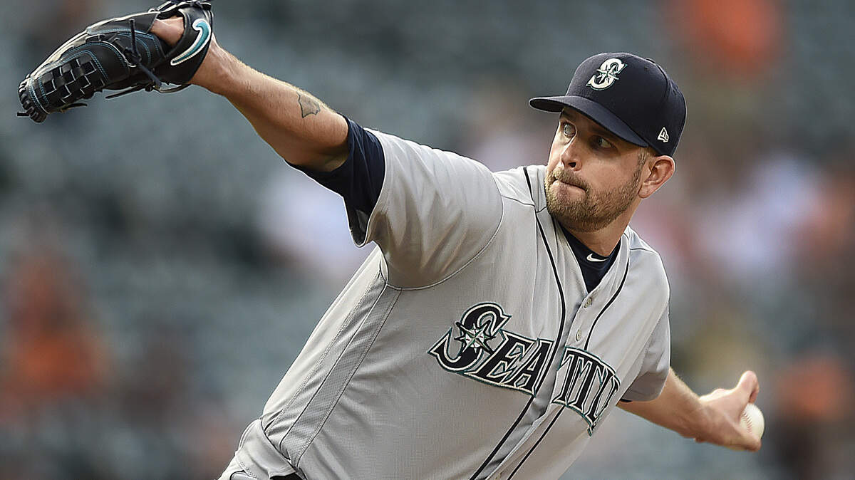 Seattle Mariners pitcher James Paxton delivers against the Baltimore Orioles in the first inning of baseball game Tuesday, June 26, 2018, in Baltimore. (AP Photo/Gail Burton)