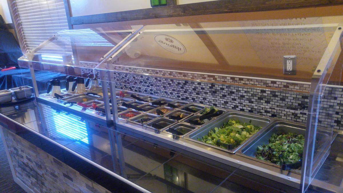 The salad bar at Napoli Italiano stocks more than two dozen ingredients and five dressings.