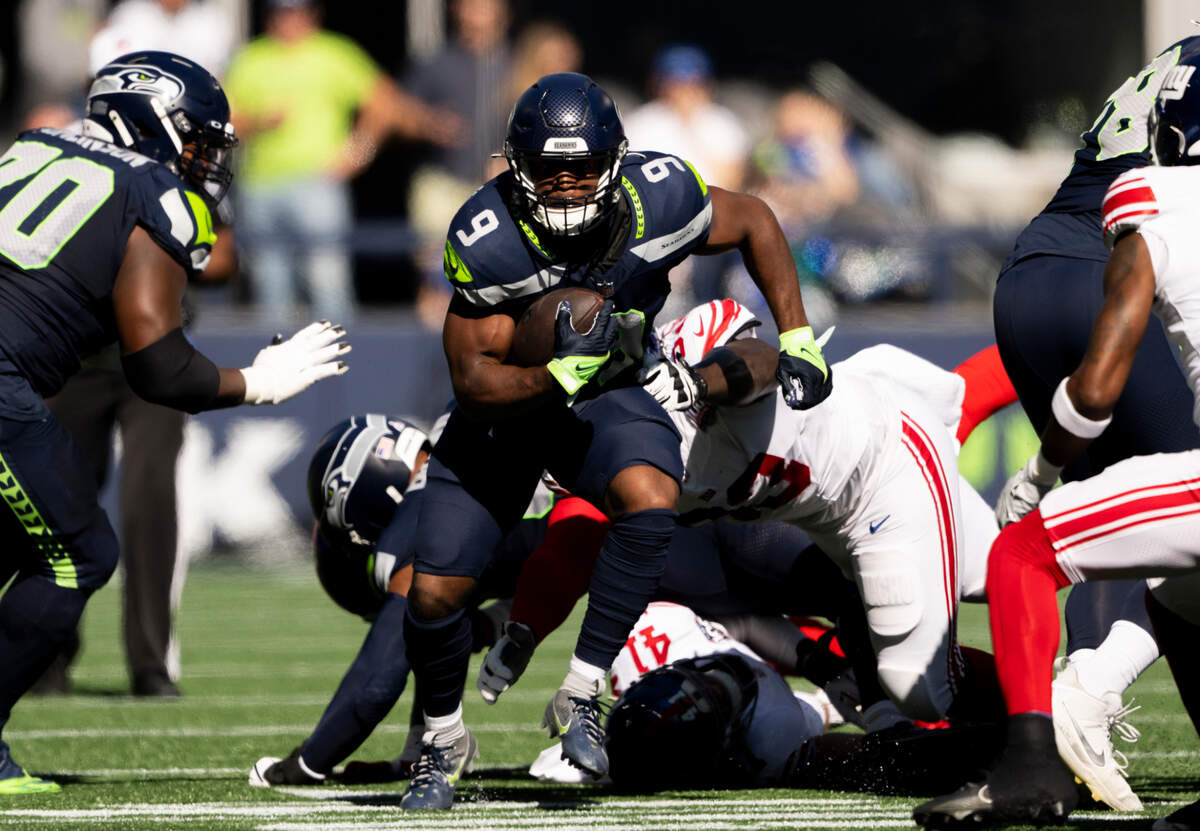 Seattle Seahawks running back Kenneth Walker III (9) carries the ball during the first quarter of the game against the New York Giants at Lumen Field, on Sunday, Oct. 6, 2024 in Seattle, Wash.