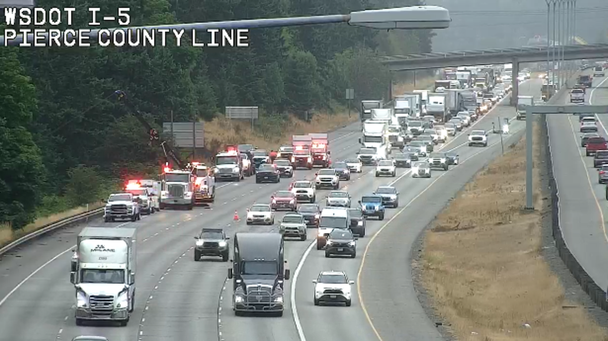 Two traffic lanes southbound I-5 is blocked after a crash involving a semi-truck on July 25, 2025.