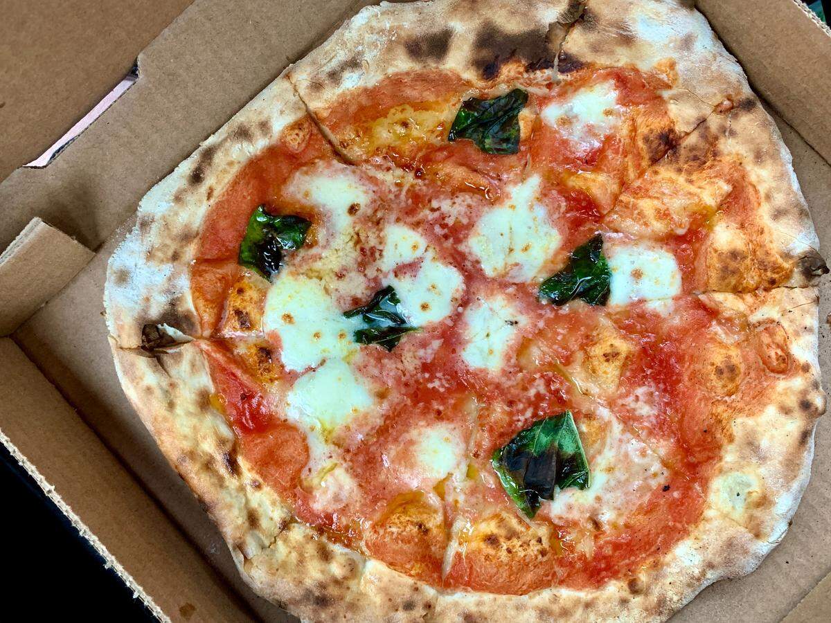 From a food truck parked at the 76 gas station in Tacoma’s North End, Italy Paola Pizza Napoletana opened in early 2023 with a simple menu of wood-fired pies. Start with the margherita.