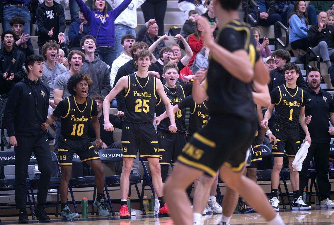 The Puyallup Vikings celebrate a rally against the Olympia Bears during Tuesday night’s 4A SPSL boys basketball game at Olympia High School in Olympia, Washington, on Jan. 14, 2025. Olympia won the game, 62-53.