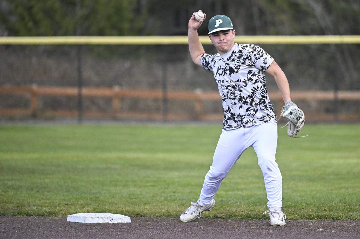 Peninsula second baseman Kainoa Coit throws during a practice on Monday, March 9, 2026, in Gig Harbor, Wash.