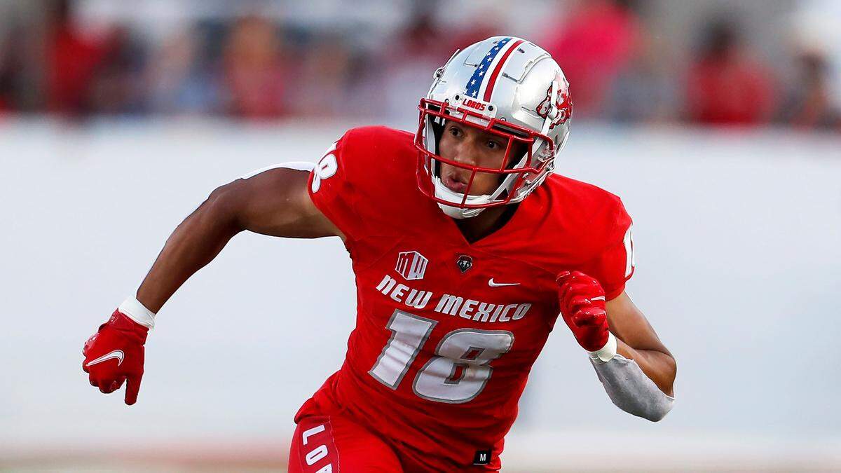New Mexico wide receiver Zarak Scruggs Jr. (18) runs upfield against New Mexico State during an NCAA college football game on Saturday, Sept. 11, 2021, in Albuquerque, N.M. (AP Photo/Andres Leighton)