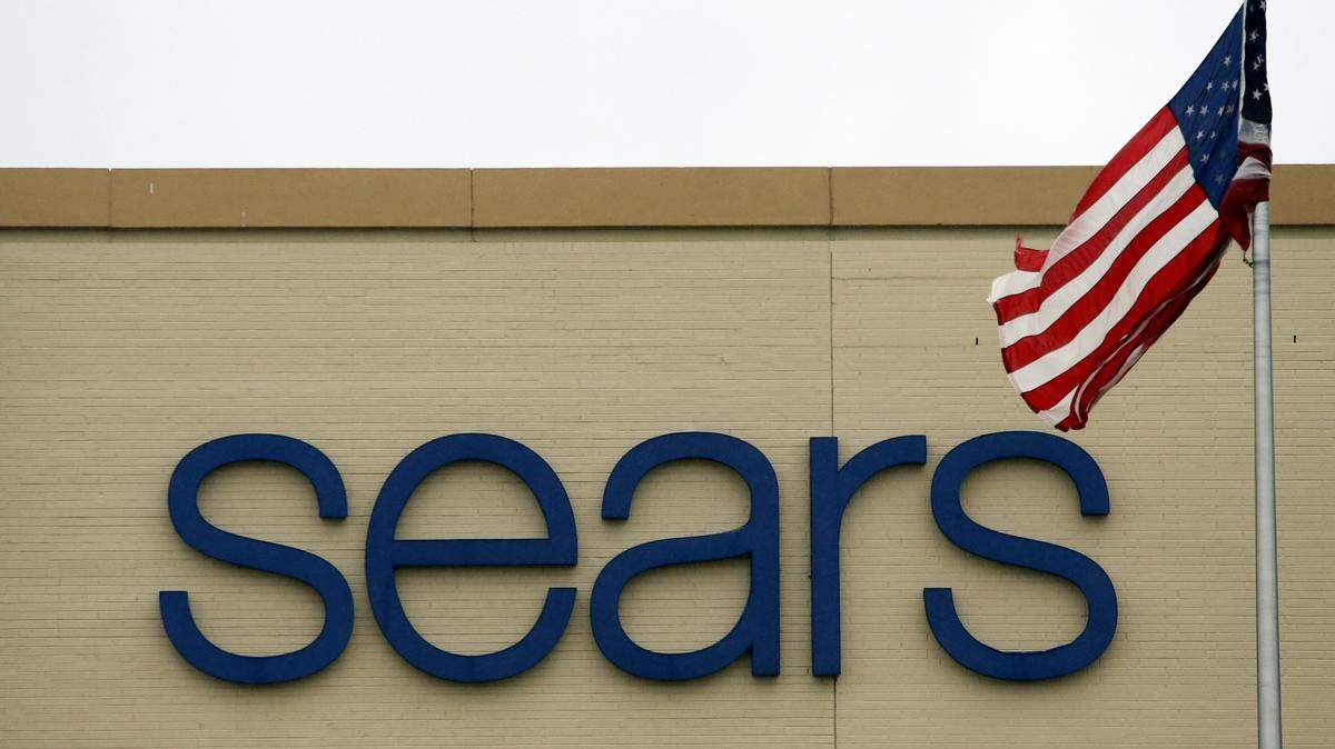 This Saturday, March 25, 2017, photo, shows a Sears retail store in Schaumburg, Ill. On Tuesday, June 13, 2017, Sears Holdings said it will cut about 400 full-time jobs as part of the troubled retailer’s plan to turn its business around. (AP Photo/Nam Y. Huh)