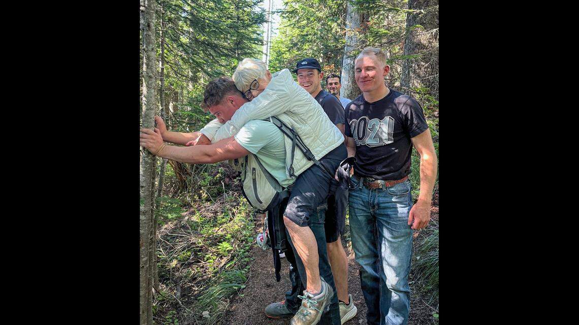 A 79-year-old Tacoma woman hurt her foot on a hike. So a JBLM airman put her on his back