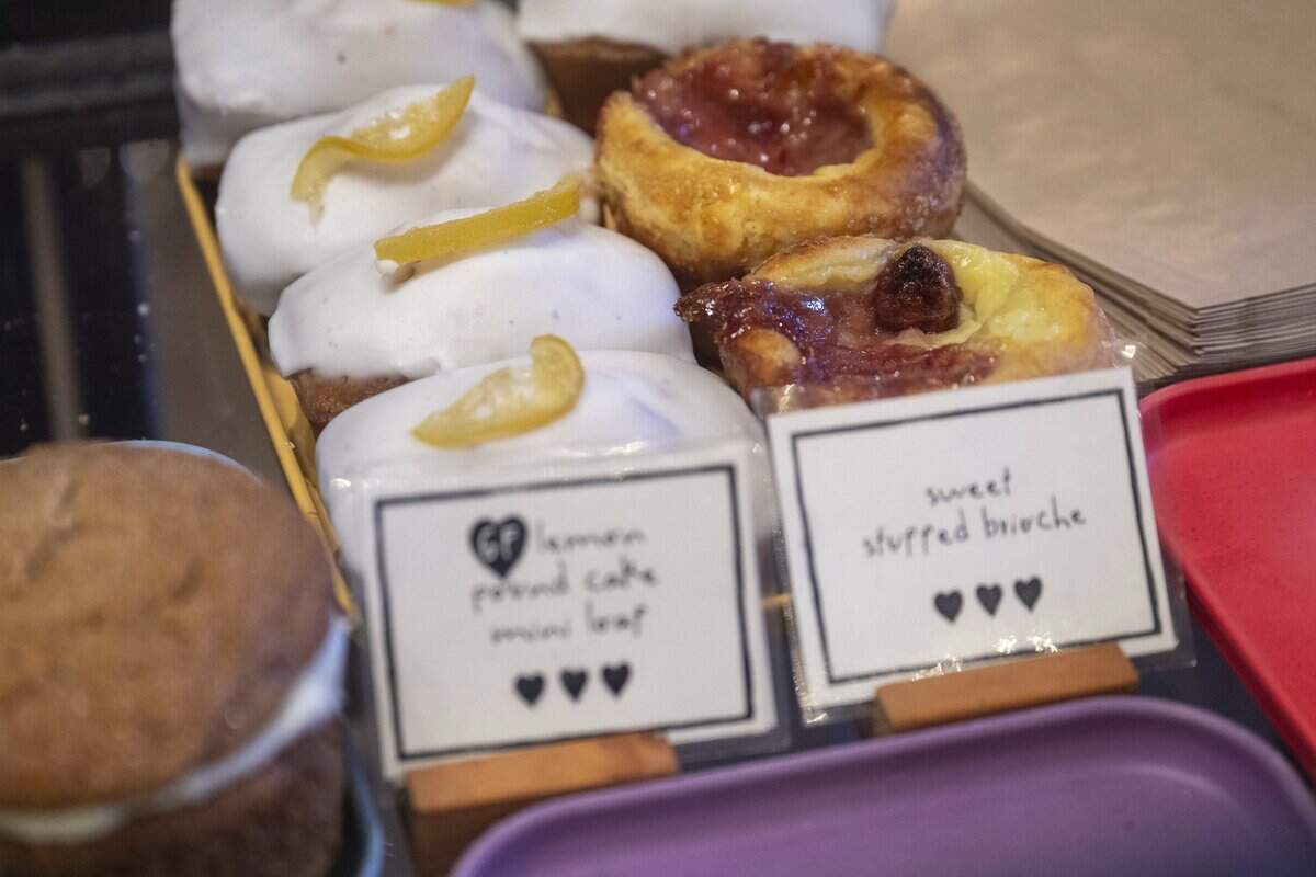 A sweet stuffed brioche sits among other pastries at the counter of Three Hearts on Friday, Jan. 23, 2026, in Tacoma, Wash.
