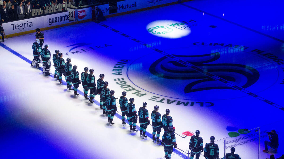 The starting lineup is introduced during the Seattle Kraken’s first ever home opener at Climate Pledge Arena in Seattle on Saturday, Oct. 23, 2021.
