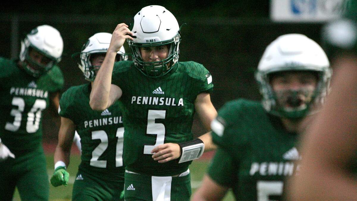 Peninsula High School senior quarterback Burke Griffin worked on his explosiveness and speed in the offseason.