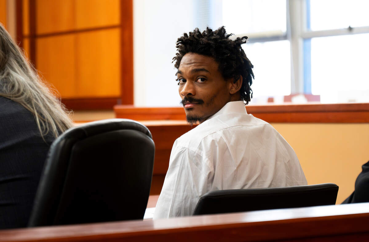 Maleke Pate looks back at the gallery as prosecutor Sunni Ko gives her opening statement in his jury trial for four counts of aggravated murder, at Pierce County Superior Court, on Tuesday, March 5, 2024, in Tacoma. Pate is accused of fatally shooting four people in Tacoma’s Salishan neighborhood on Oct. 21, 2021.