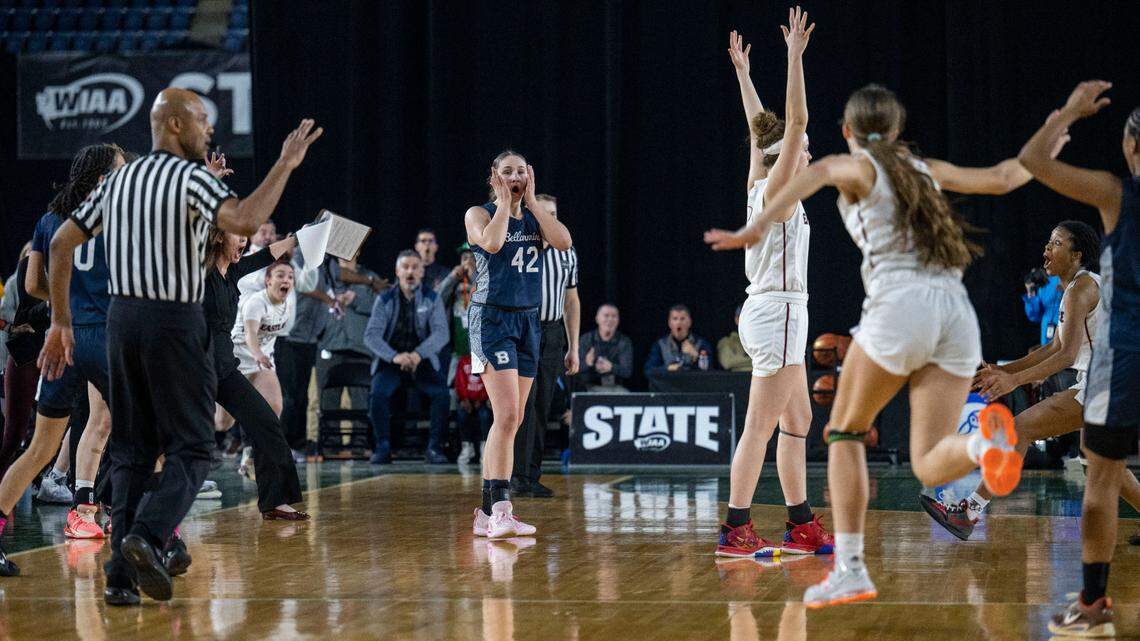 Bellarmine Prep forward Taylor Teeple (42) reacts in shock after Eastlake forward Ava Schmidt (31) made a buzzer-beater in overtime to beat the Lions, 62-60, in a Class 4A quarterfinal game on Thursday, March 2, 2023, in Tacoma, Wash.