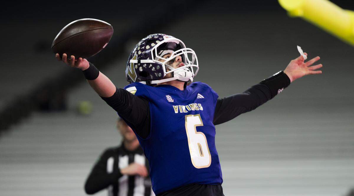 Lake Stevens quarterback Blake Moser (6) reacts to a touchdown during the first quarter of the 4A State Championship game against the Sumner Spartans at Husky Stadium, on Saturday, Dec. 6, 2025, in Seattle.