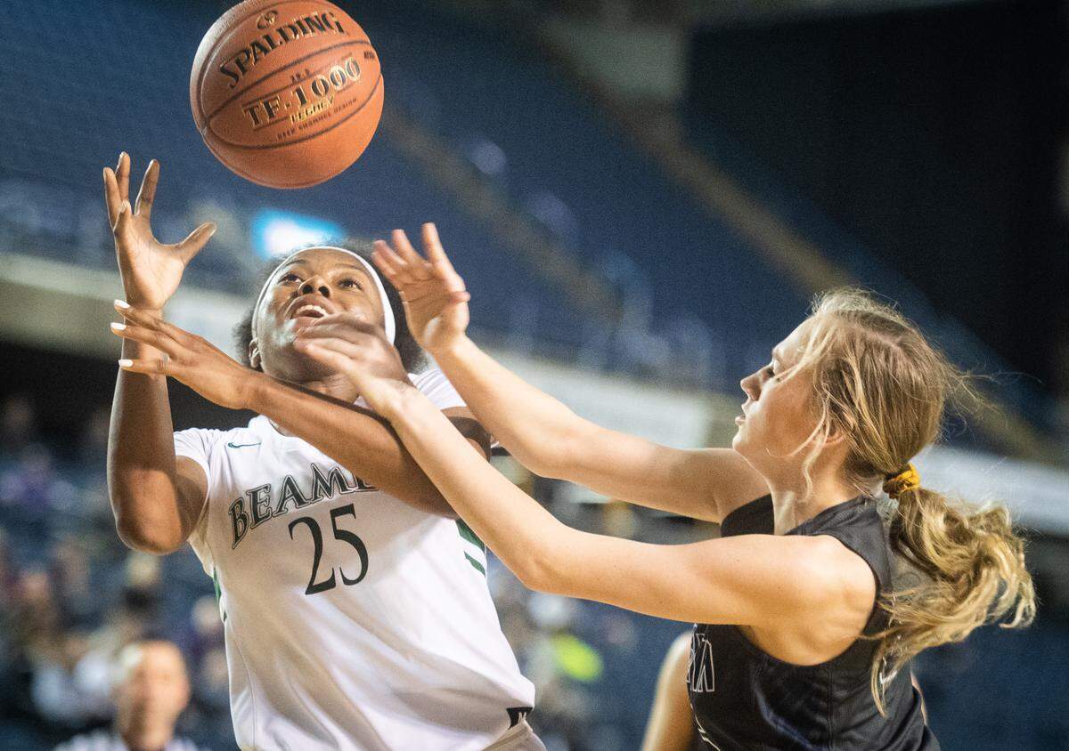 Todd Beamer’s Aaliyah Alexander is fouled as she shoots during the fourth quarter. Todd Beamer played Chiawana in a basketball game at Hardwood Classic at the Tacoma Dome in Tacoma, Wash., on Friday, March 6, 2020.