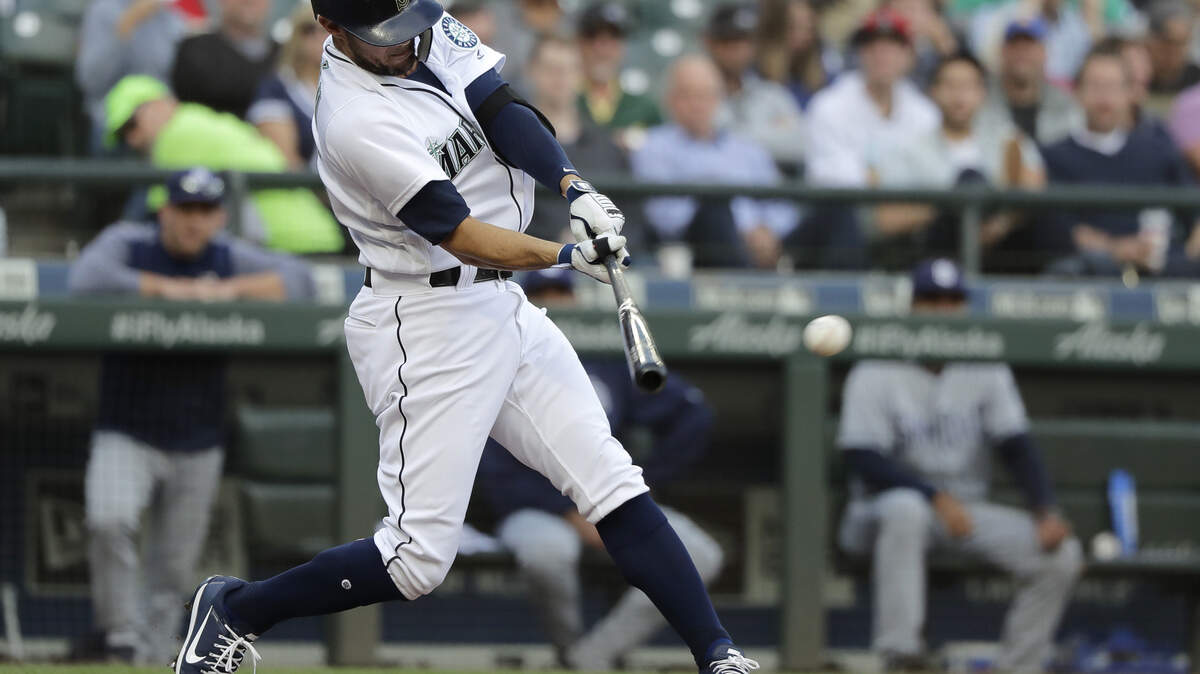 Seattle Mariners’ Kristopher Negron singles to load the bases during the fourth inning of a baseball game against the San Diego Padres, Wednesday, Sept. 12, 2018, in Seattle. (AP Photo/Ted S. Warren)