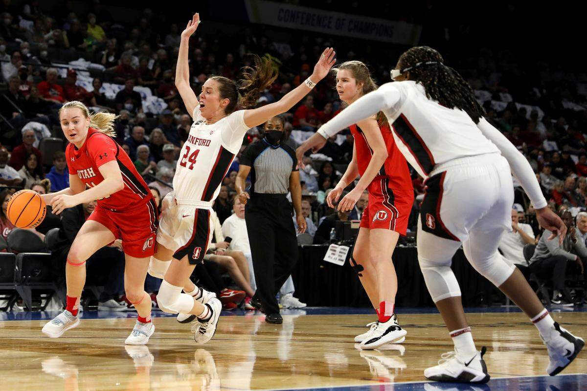 Utah guard Brynna Maxwell (11) is fouled by Stanford guard Lexie Hull (12) while Utah forward Kelsey Rees (53) and Stanford forward Francesca Belibi (5) watch the ball during the first half of the NCAA Pac-12 basketball tournament championship game, Sunday, March 6, 2022, in Las Vegas. (AP Photo/Ellen Schmidt)
