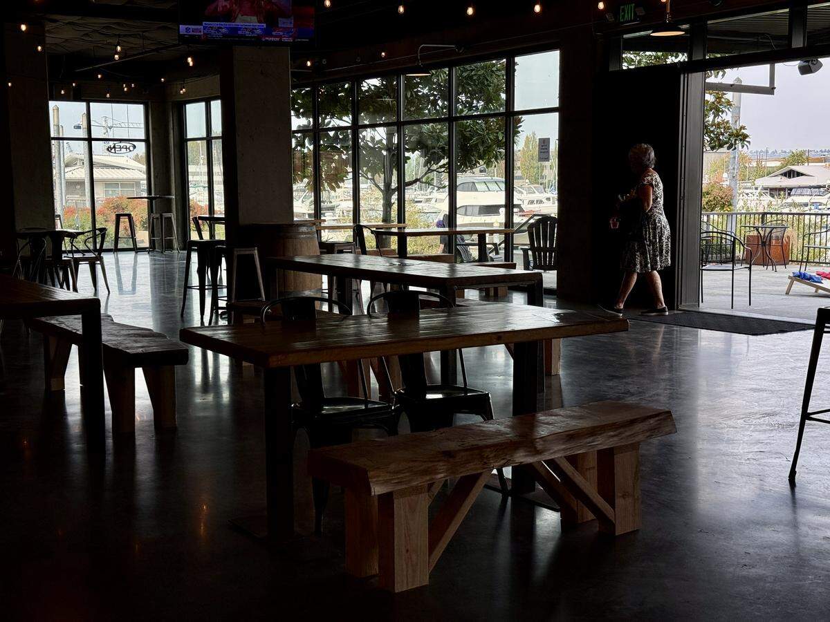 The new Evergreen State Brewing taproom on Thea Foss Waterway features a spacious interior and dog-friendly patio with games, plus barbecue by We Be Smok’n.