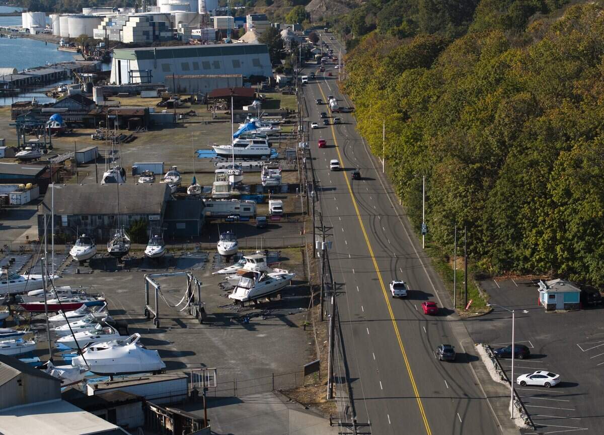 Vehicles drive alone Marine View Drive, on Monday, Oct. 6, 2025, in Tacoma, Wash. Residents say that the stretch of road and the adjacent Norpoint Way NE are dangerous and prone to speeding and car crashes.