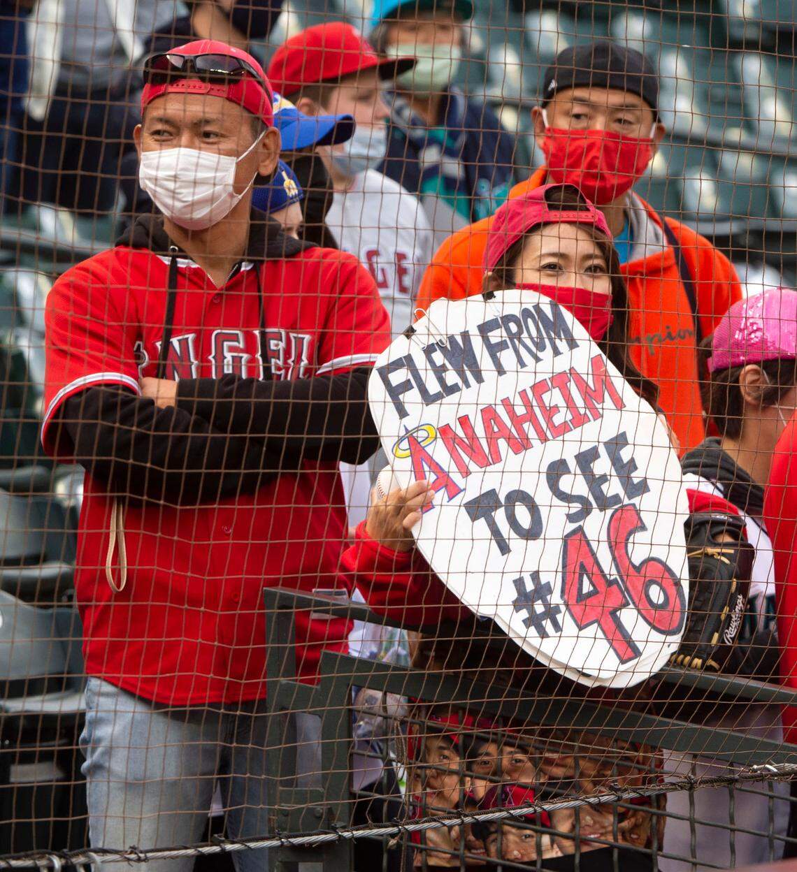 Fans of Shohei Ohtani wait during batting practice for a glimpse of their hero but he didn’t appear until gametime.The Mariners lost 2-1 to the Angels Friday night, Oct. 1, at T-Mobile Park in Seattle, dimming their playoff hopes.