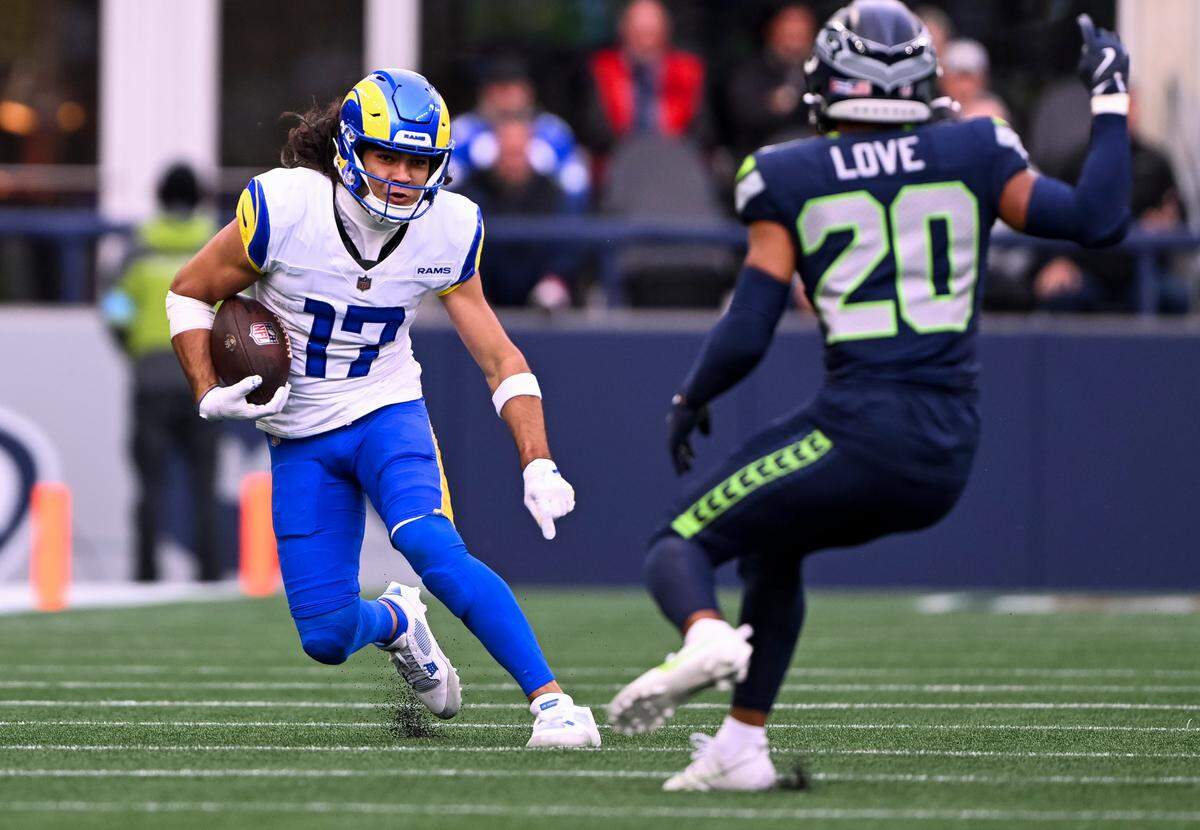 Los Angeles Rams wide receiver Puka Nacua (17) jukes Seattle Seahawks safety Julian Love (20) during the second quarter of the game at Lumen Field, on Sunday, Nov. 3, 2024 in Seattle, Wash.