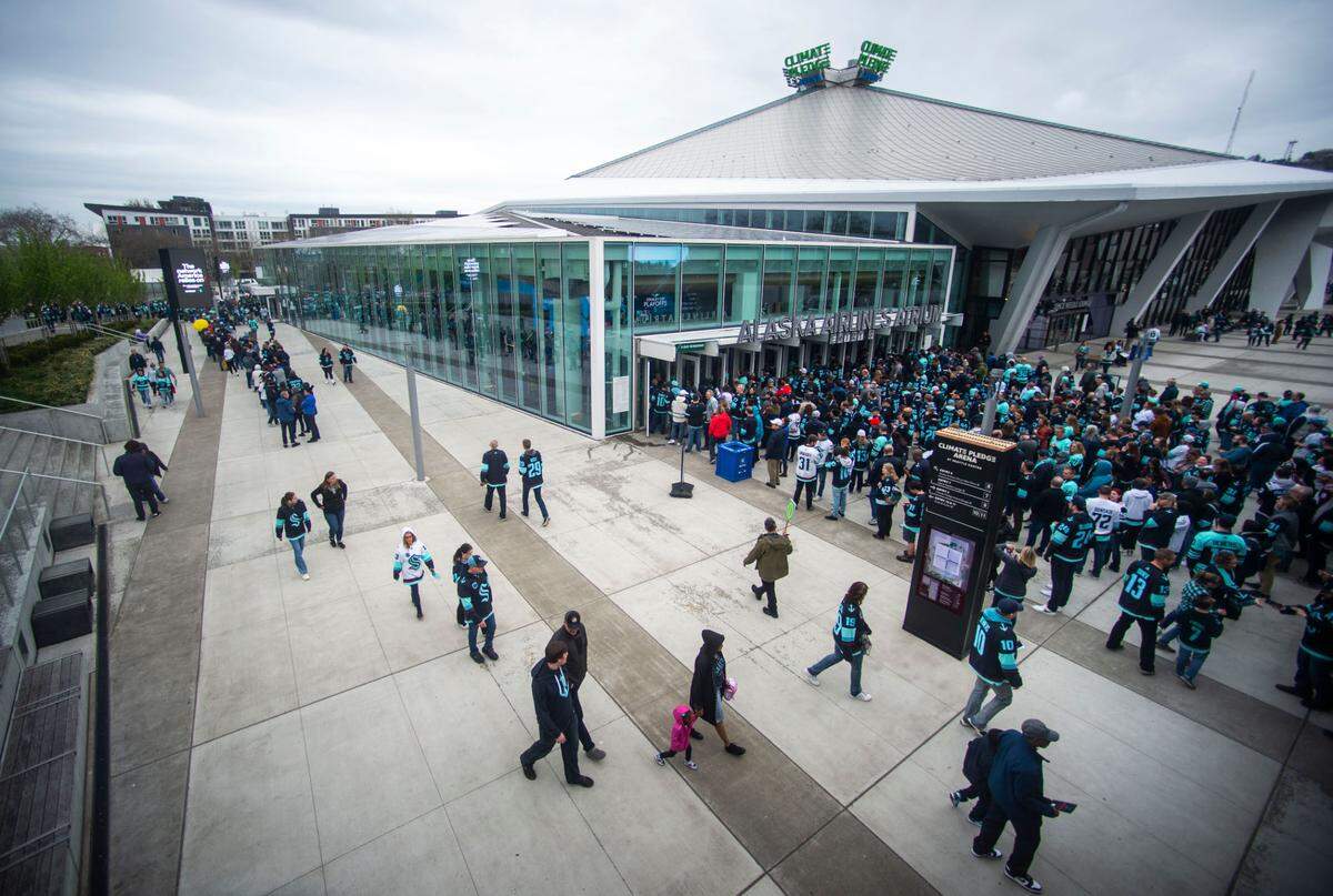 Kraken fans line up outside of the Climate Pledge Arena before the start of the Kraken’s first round 2023 Stanley Cup playoff game against the Colorado Avalanches in Seattle on Saturday, April 22, 2023.