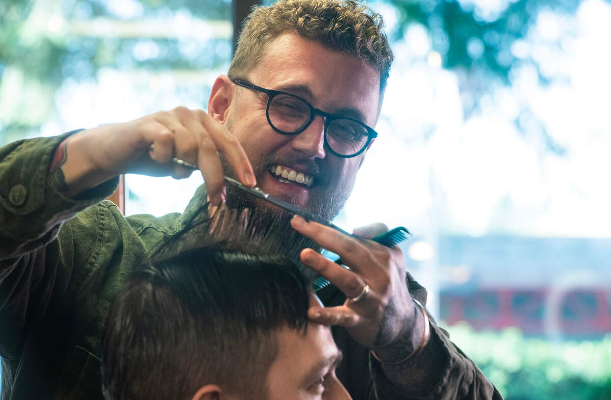 Owner Stewart Wentworth cuts hair at his Black Cat Barbershop & Salon in Gig Harbor, Washington, on Tuesday, Nov. 7, 2023.