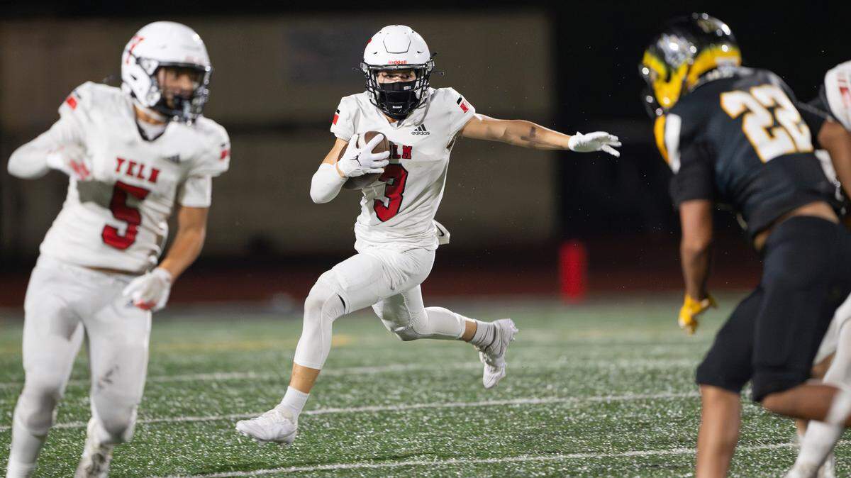 Yelm’s Marcus Ronquillo (5) runs the ball against Lincoln during the second half of the game at Lincoln High School, on Friday, Sept. 13, 2024, in Tacoma, Wash.