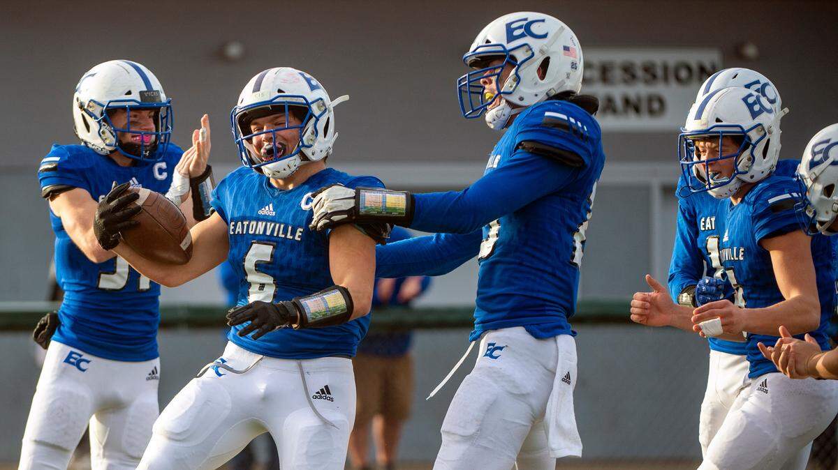 Eatonville’s Blain Hanly celebrates after running an interception back for a touchdown in the fourth quarter of a State 1A quarterfinal game against Riverside on Saturday afternoon at Art Crate Field in Spanaway.