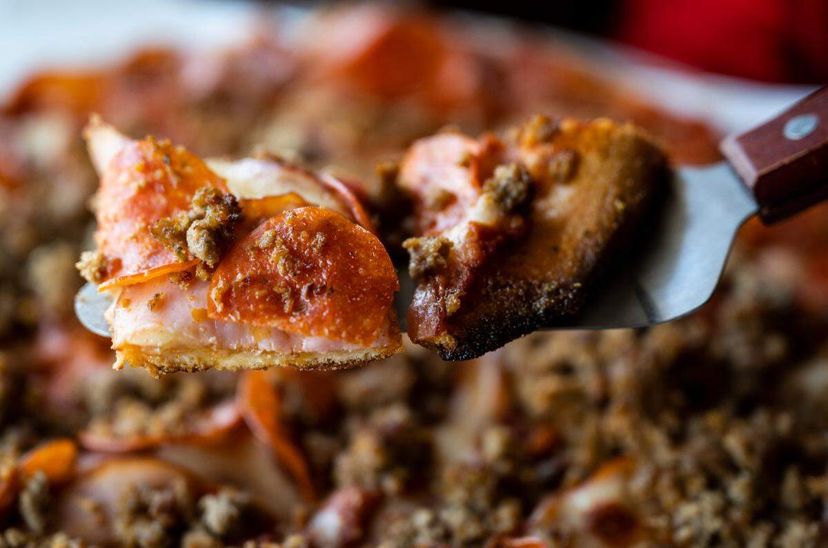The new Spud’s pizza, cut into small squares, makes for a very shareable bar pie. The crust has a great crispiness to it, thanks to freshness and semolina flour when it’s pressed to order.