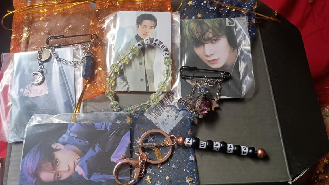 Cheriden Boyett, 37, is an ATEEZ fan or “Atiny” and told The News Tribune she and her group made “freebies” to pass out to other fans last year, staying up until 4 a.m. the morning of the concert. This year, she’s making bracelets, pins, and keychains with unofficial photo cards to pass out, she wrote in a message.