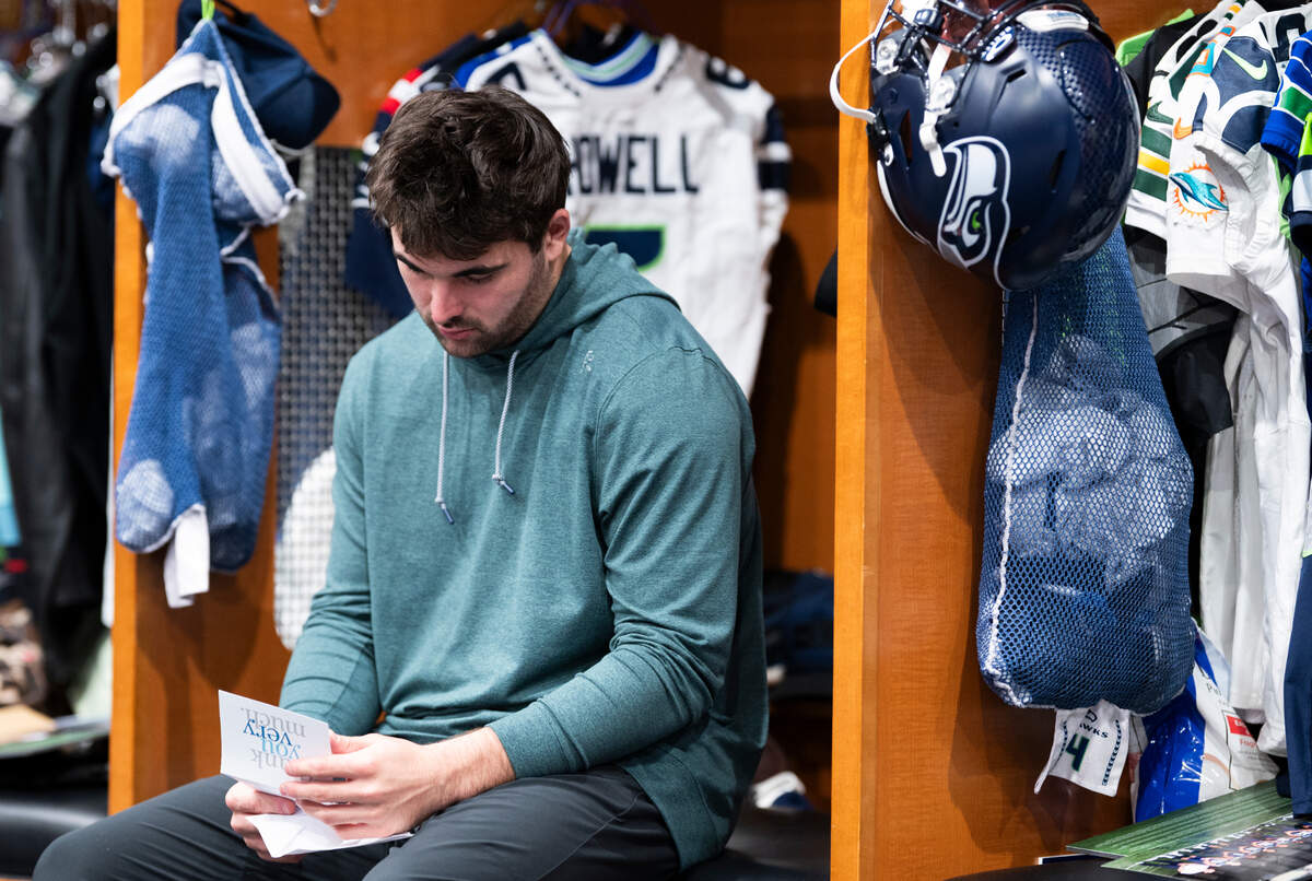 Seattle Seahawks quarterback Sam Howell (6) clears out his locker at the Virginia Mason Athletic Center, on Monday, Jan. 6, 2025, in Renton, Wash.