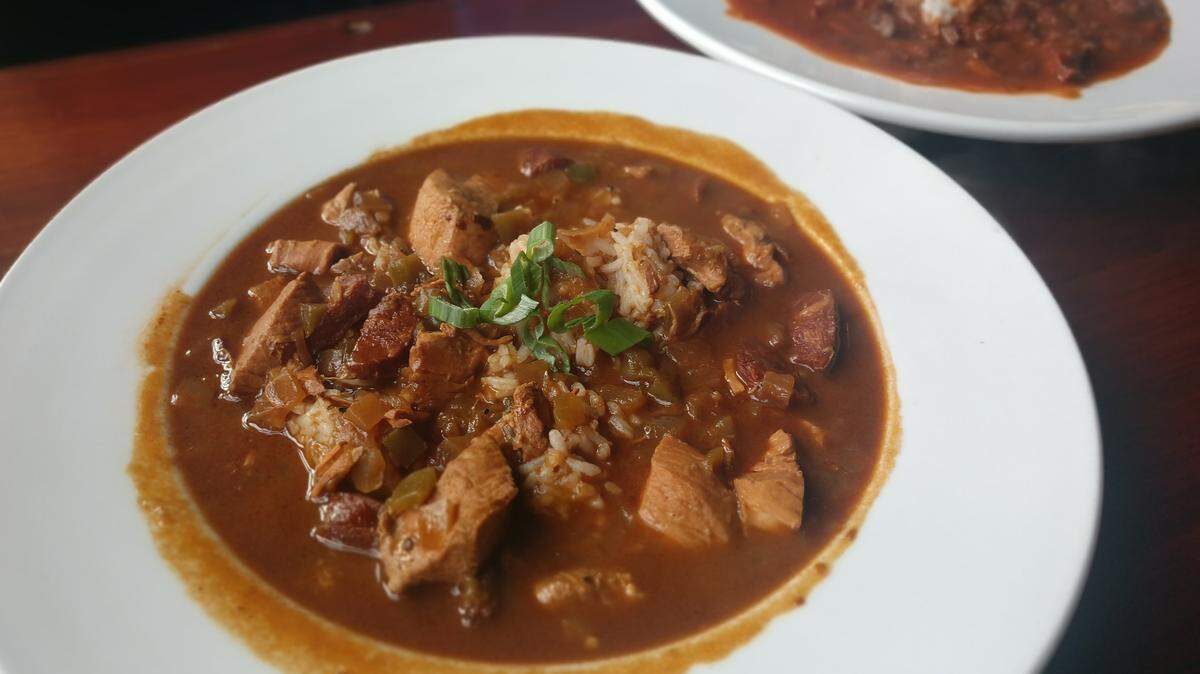 Chicken-and-sausage gumbo, front, and red beans and rice, rear, from Doyle’s Public House in Tacoma.