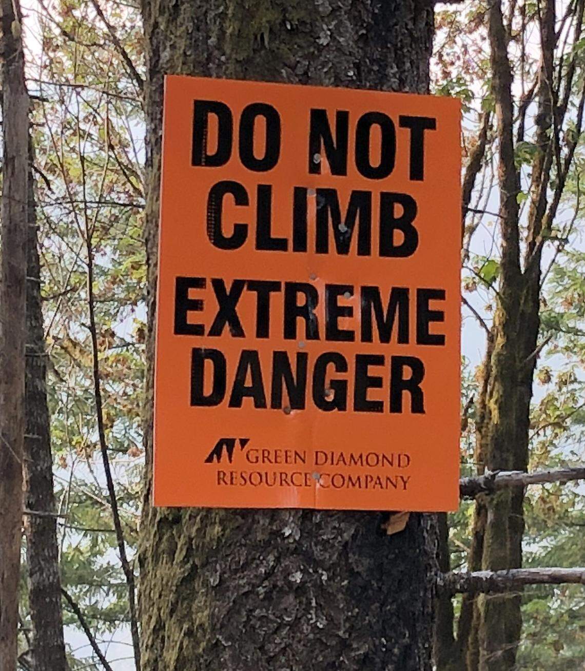 Seattle-based Green Diamond Resource Company has placed numerous signs around the Vance Creek Bridge to warn off thrill seekers and trespassers. It’s a constant battle to keep people from climbing onto the dangerous bridge.