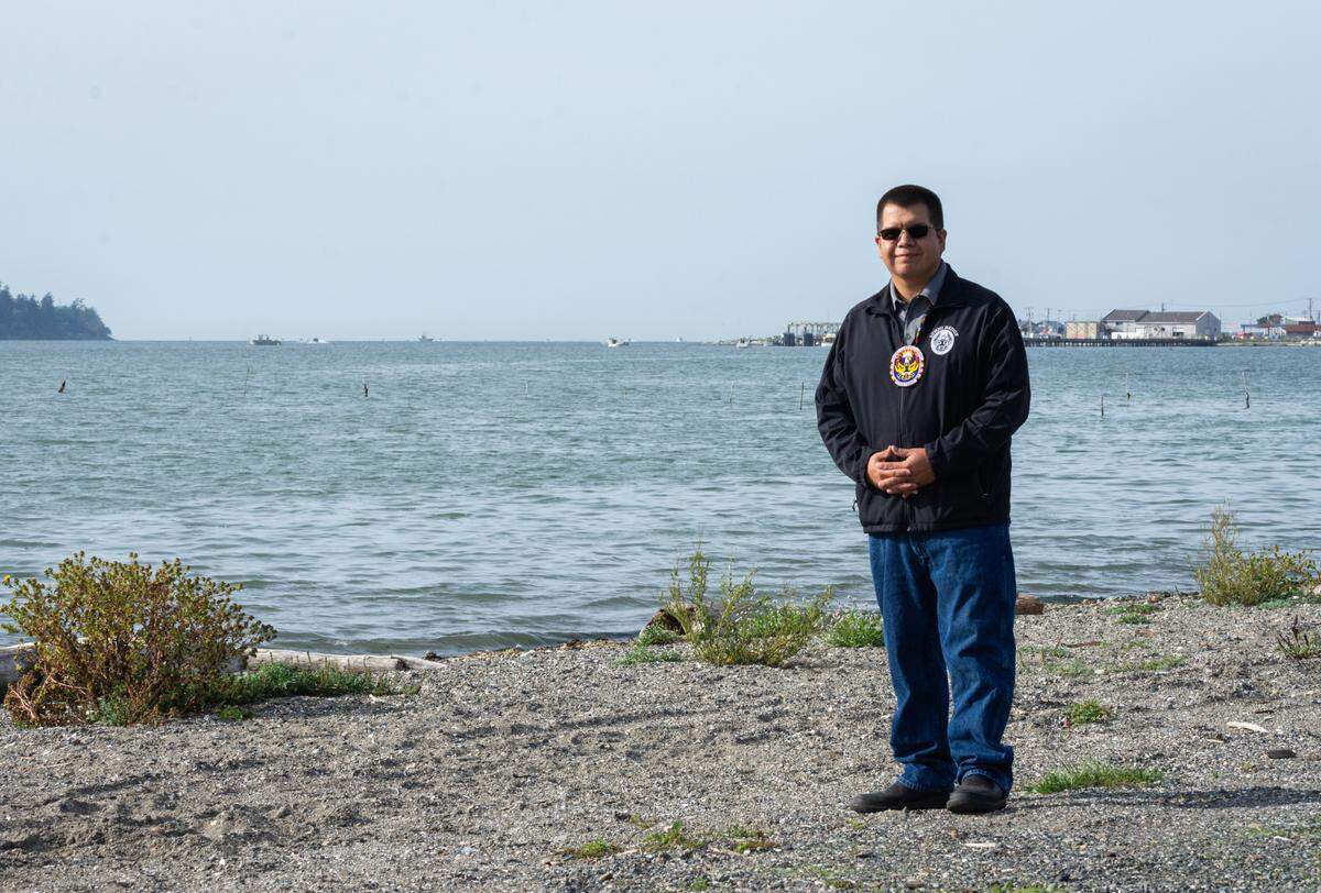 Lummi Nation Chairman Lawrence Solomon stands on the Stommish grounds, land that his family owned for generations, on Friday, Oct. 1. His great-grandmother Edith Jones and her husband Vic held the first Stommish in 1946 in honor of their two sons, Bill and Stanley Solomon, and other Lummi veterans who returned home from World War II. Chairman Solomon, a Navy veteran and leader of the Blackhawk Singers, is currently in his second year as chairman for the Tribe.