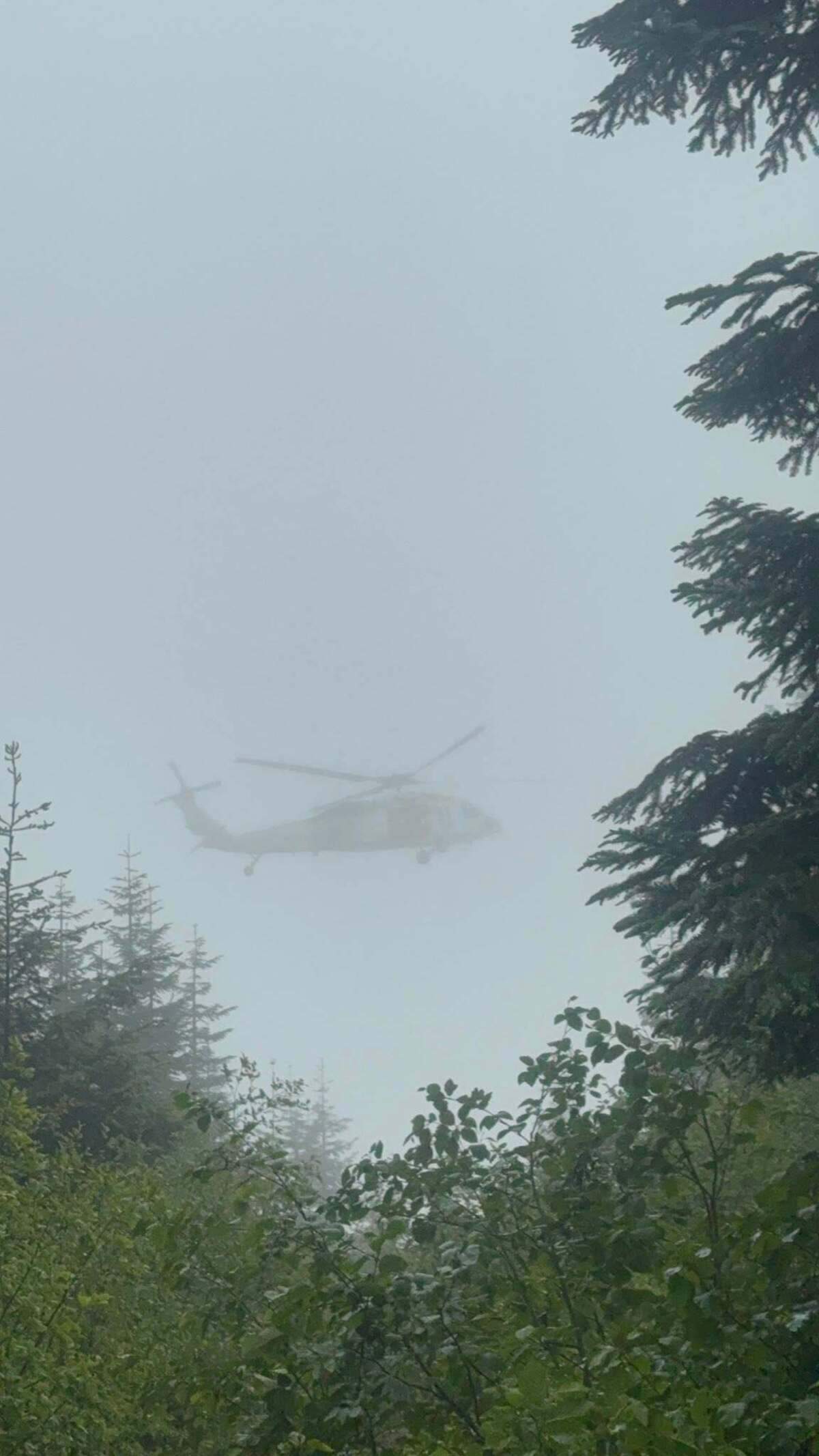Crews rescue two men after a 250-foot cliff fall at T-Rex Falls near Wilkeson. on June 26, 2026.