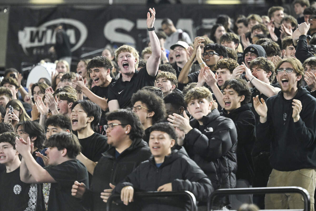 Bellarmine Prep students celebrate their team in the final moments of the quarterfinal round of the 3A State Tournament against Edmonds-Woodway at the Tacoma Dome, on Thursday, March 5, 2026, in Tacoma, Wash.