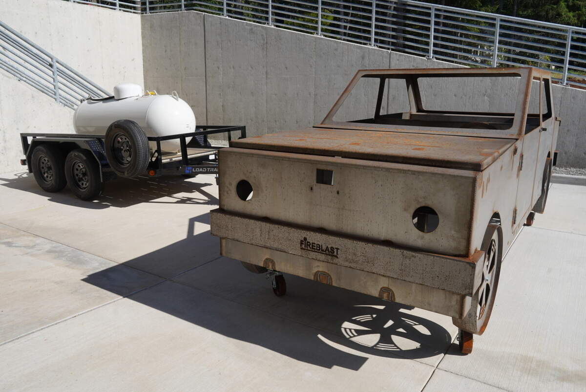 A portable car fire prop outside the Gig Harbor Fire & Medic One training tower near Gig Harbor, Wash., on Wednesday, June 24, 2026.