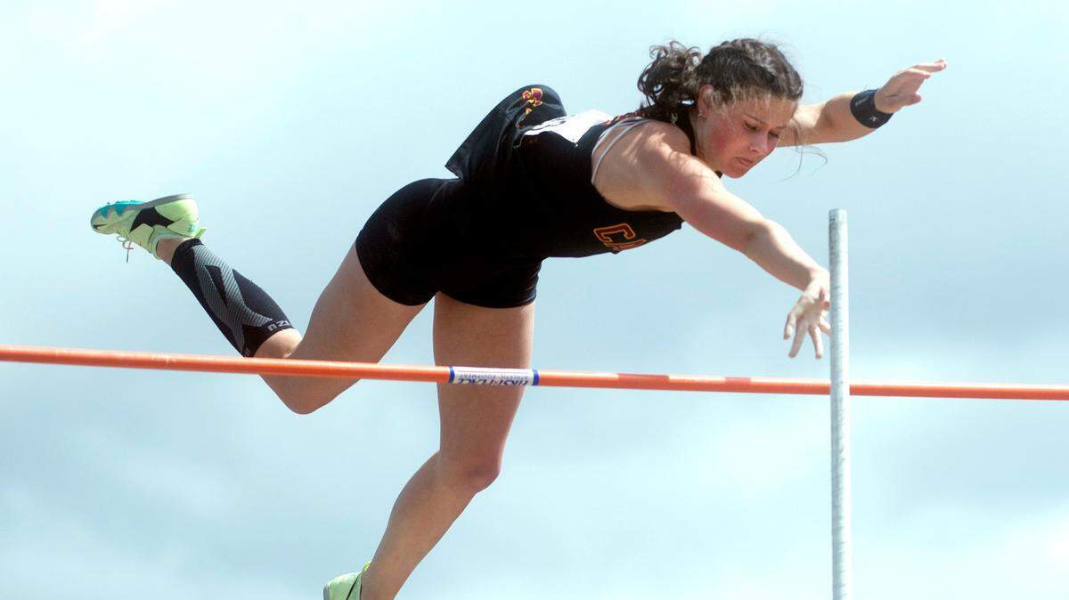 Capital junior Hana Moll clears the bar at 13’ en route to a second-place finish in the 3A girls pole vault competition during the second day of the WIAA State Track and Field Championships at Mount Tahoma High School in Tacoma, Washington on Friday, May 27, 2022.