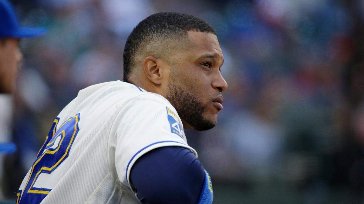 FILE - In this Sept. 24, 2017, file photo, Seattle Mariners' Robinson Cano watches from the dugout during a baseball game against the Cleveland Indians in Seattle. Cano has been suspended 80 games for violating baseball's joint drug agreement, the league announced Tuesday, May 15, 2018.  (AP Photo/Ted S. Warren<F ile)