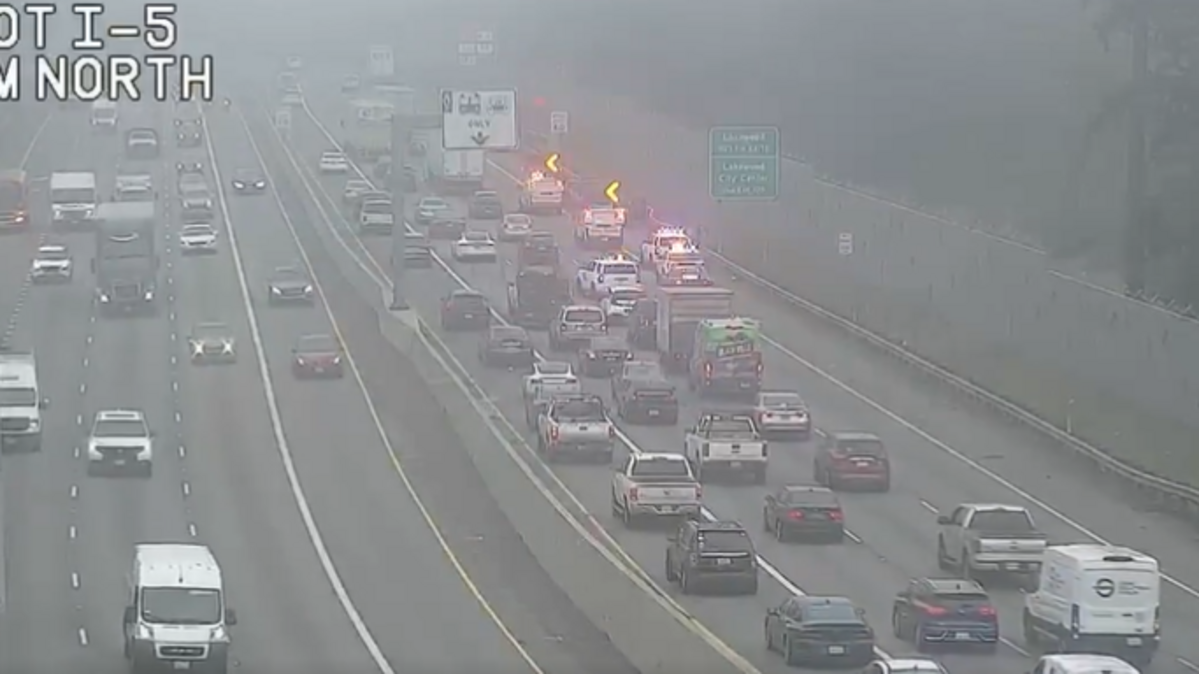 The right lane is closed near the JBLM main gate is closed due to a collision.