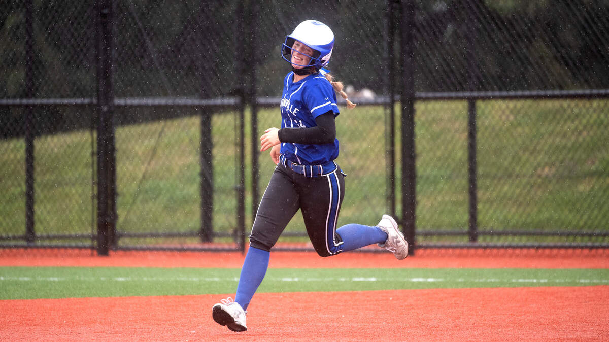 Eatonville’s Hailey Rath smiles as she rounds the bases on a two-run home run during Thursday evening’s 2A SPSL district championship fastpitch game against Franklin Pierce at Foss High School in Tacoma, Washington, on Thursday, May 6, 2021.