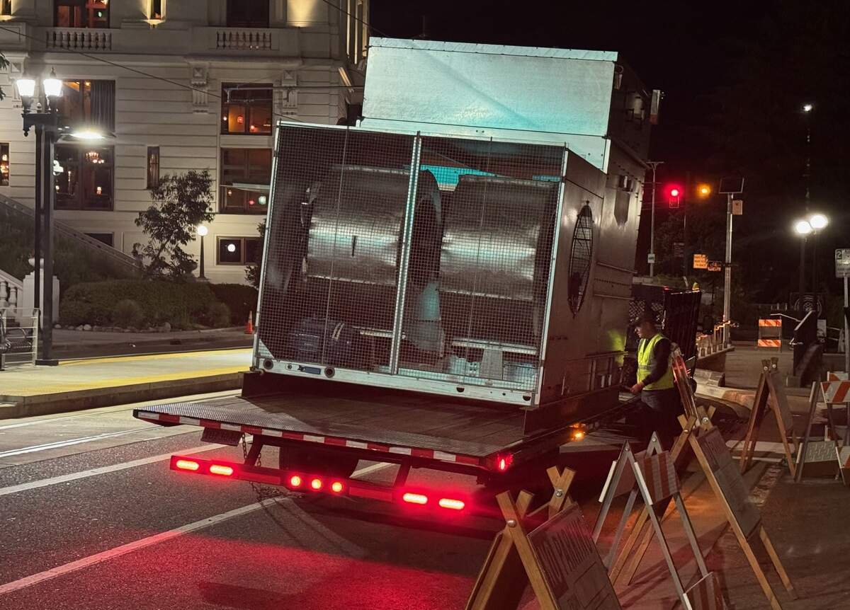 The arrival of HVAC equipment that was installed overnight June 10, 2024, atop Tacoma’s Old City Hall.
