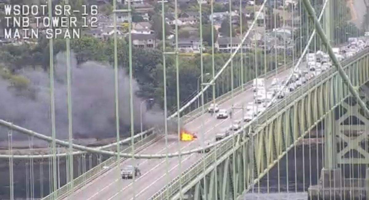 A car caught on fire on the Narrows Bridge in Tacoma on Wednesday, August 30, 2023.