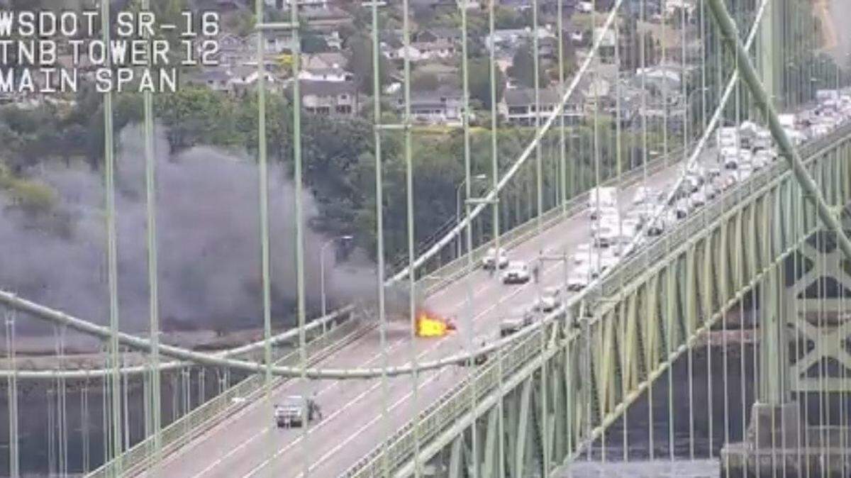 A car caught on fire on the Narrows Bridge in Tacoma on Wednesday, August 30, 2023.